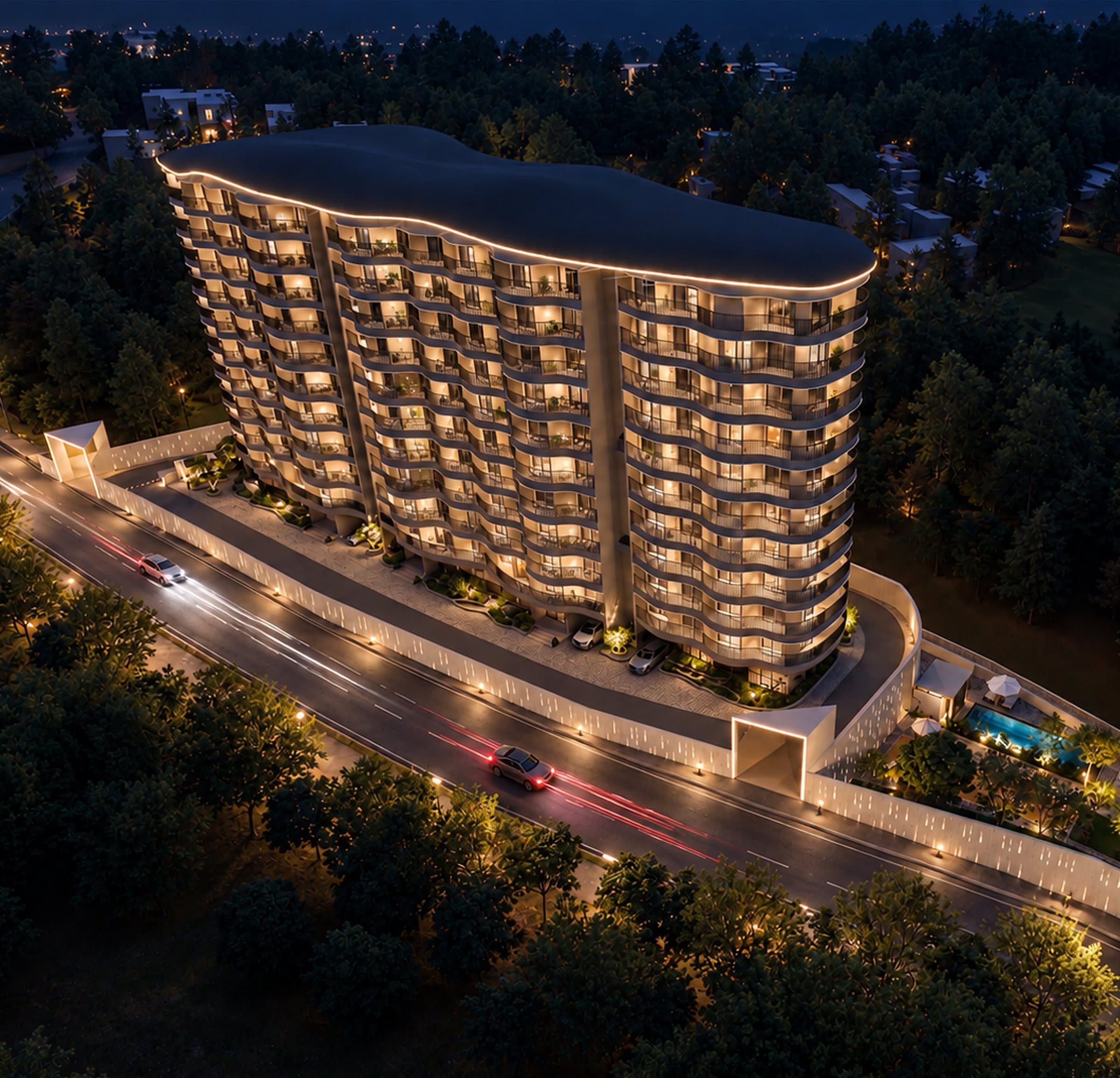 Asiya Views tower at night, its wave-shaped balconies lit above the trees of Natekal